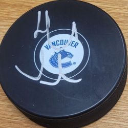 Autographed HENRIK SEDIN Vancouver Canucks Hockey Puck