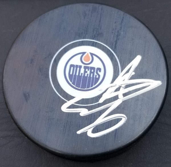 Autographed ADAM LARSSON Edmonton Oilers Hockey Puck