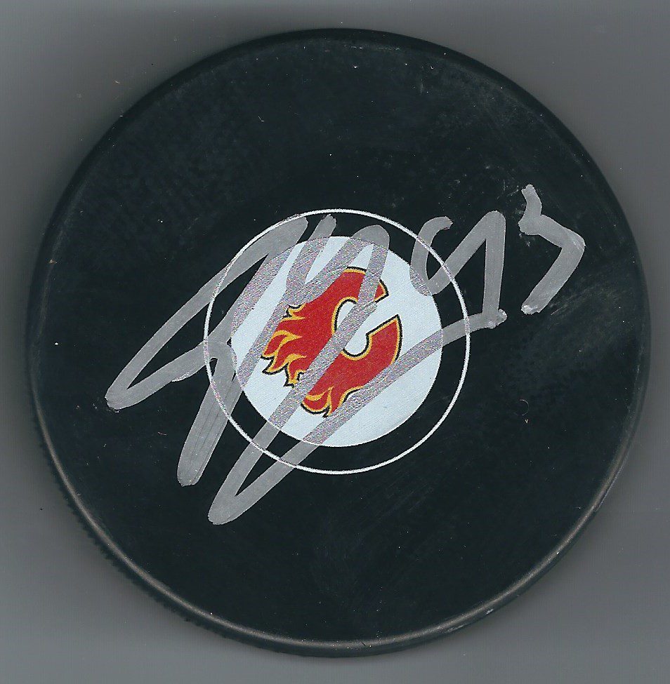 Autographed SAM BENNETT Calgary Flames Hockey Puck - Main Line Autographs