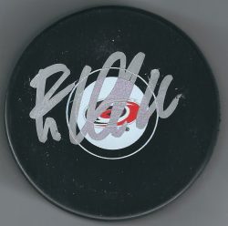 Autographed ELIAS LINDHOLM Carolina Hurricanes Hockey Puck