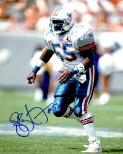 Autographed HUGH GREEN 8X10 Miami Dolphins photo