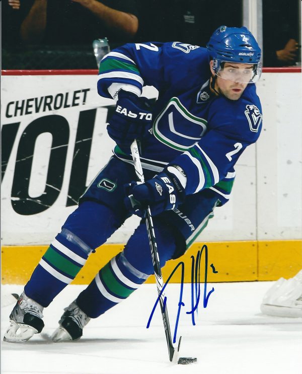 Autographed DAN HAMHUIS 8X10 Vancouver Canucks Photos