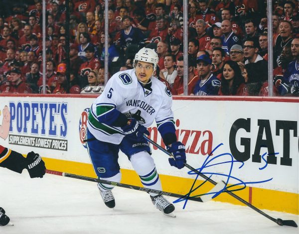 Autographed LUCA SBISA 8X10 Vancouver Canucks Photos