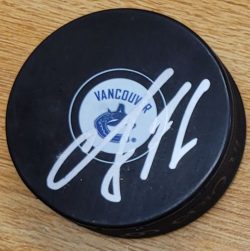 Autographed CHRISTOPHER TANEV Vancouver Canucks Hockey Puck