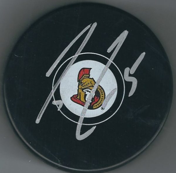 Autographed CODY CECI Ottawa Senators Hockey Puck