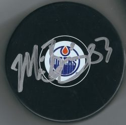 Autographed MATT BENNING Edmonton Oilers Hockey Puck