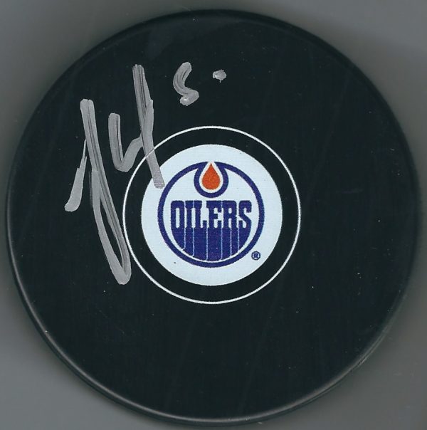 Autographed JONAS GUSTAVSSON Edmonton Oilers Hockey Puck