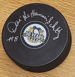 Autographed DAVE SCHULTZ Pittsburgh Penguins 50th Anniversary Hockey Puck