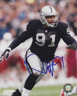 Autographed  REGAN UPSHAW 8X10 Oakland Raiders photo