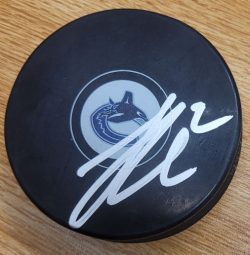 Autographed LUKE SCHENN Vancouver Canucks Hockey Puck