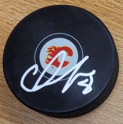 Autographed CHRISTOPHER TANEV Calgary Flames Hockey Puck