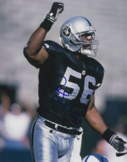 Autographed PAT SWILLING  8x10 Oakland Raiders photo
