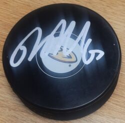 Autographed RICKARD RAKELL Anaheim Ducks Hockey Puck