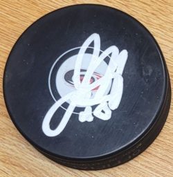 AUTOGRAPHED JORDAN MARTINOOK Carolina Hurricanes Hockey Puck