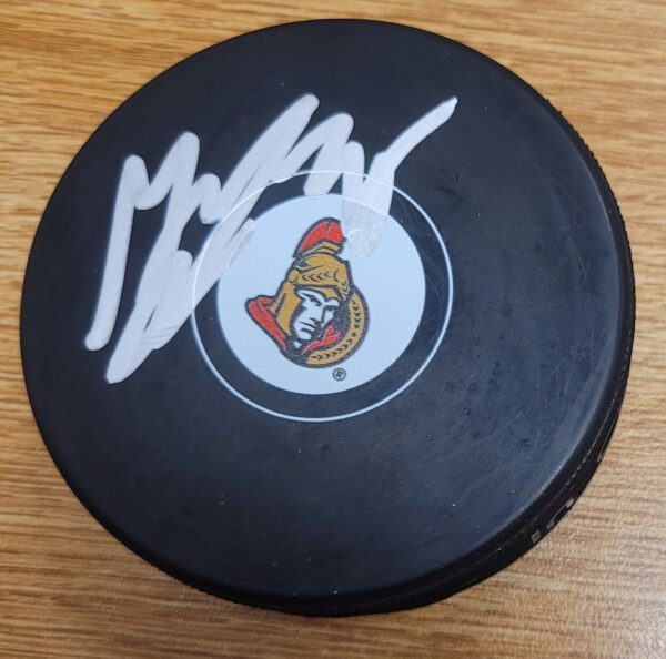 Autographed MARCUS HOGBERG Ottawa Senators Hockey Puck
