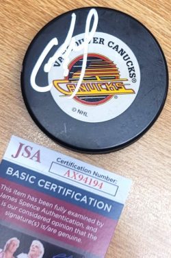 Autographed CAM NEELY Vancouver Canucks Hockey Puck JSA