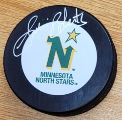 Autographed GORDIE ROBERTS Minnesota North Stars Hockey Puck