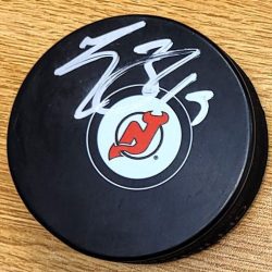 Autographed TRAVIS ZAJAC New Jersey Devils Hockey Puck
