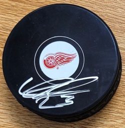 AUTOGRAPHED LUCAS RAYMOND Detroit Red Wings Hockey Puck
