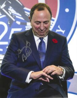 Autographed GARY BETTMAN 8x10 Hockey Hall of Fame Photo